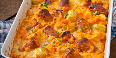 Casserole with sausage bacon apples pumpkin cheese sauce