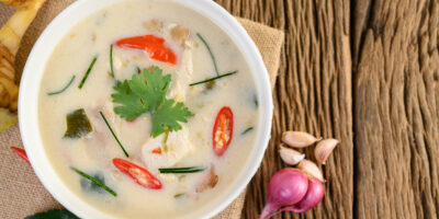 Tom kha kai bowl with kaffir lime leaves lemongrass red onion galangal chilli