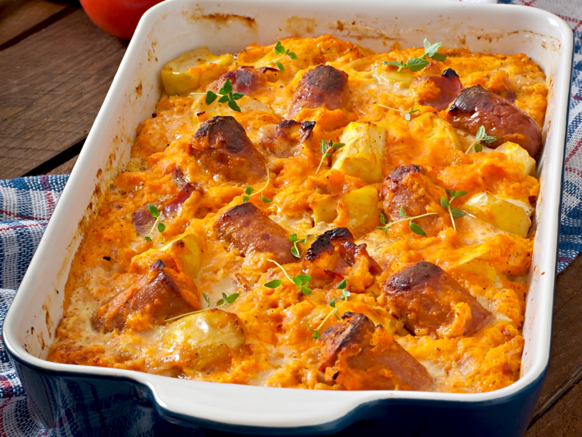 Casserole with sausage bacon apples pumpkin cheese sauce